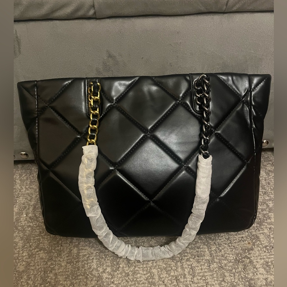 Black quilted tote bag